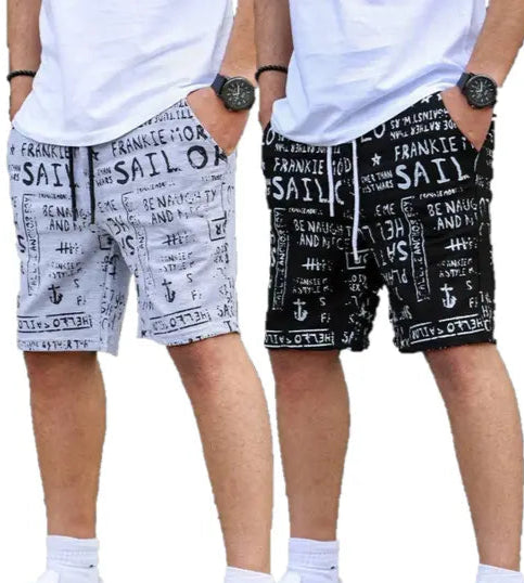Two pairs of stylish summer shorts for men in white and black with graphic text print by KN Enterprises